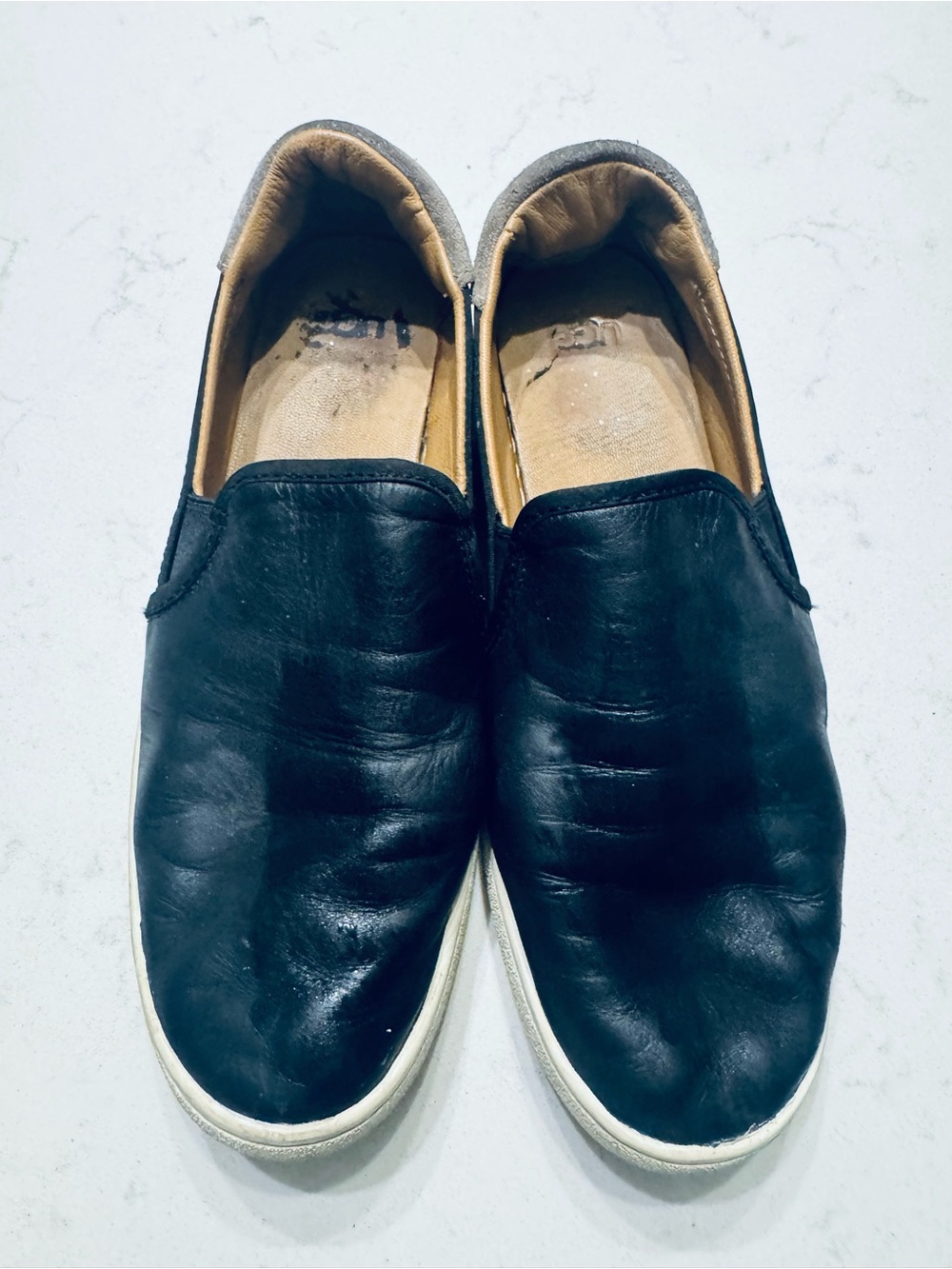 UGG Womenโs Size 10 Black Leather Slip On Sneakers Casual Shoes